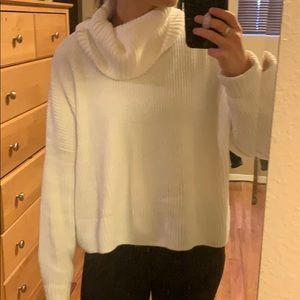 Cropped white turtleneck sweater